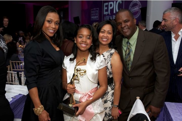 h.e.r singer parents